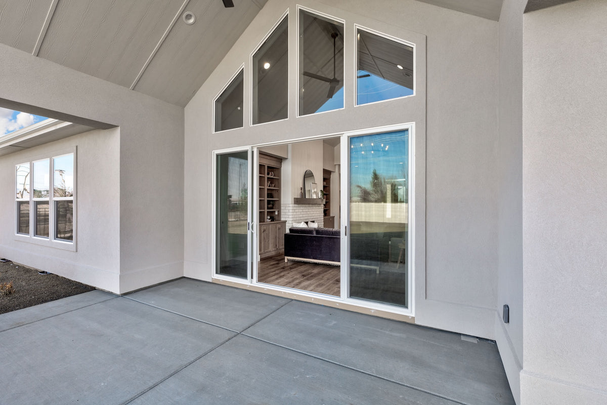 Modern interior with large windows and a vaulted ceiling