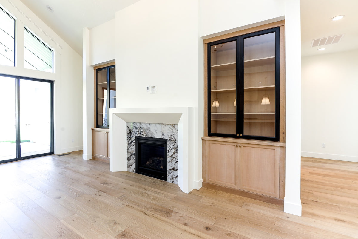 Modern living room with a fireplace and wooden floor