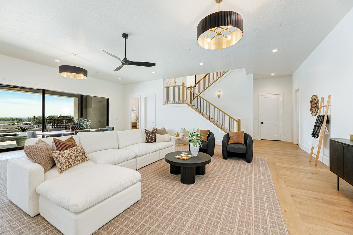 Highland Homes- Parade of Homes -  game room with inset carpet and white oak floors in Eagle, ID. 