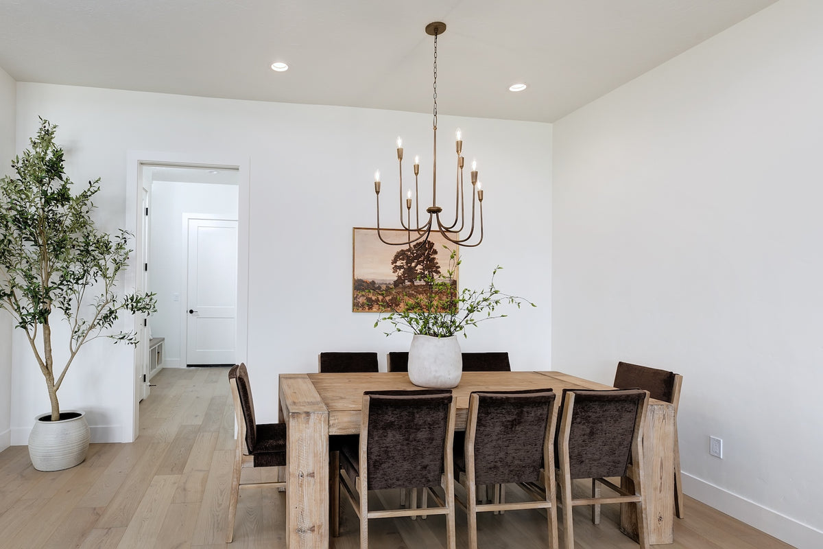Highland Homes dining room with iron light fixture in Valnova, Eagle, ID