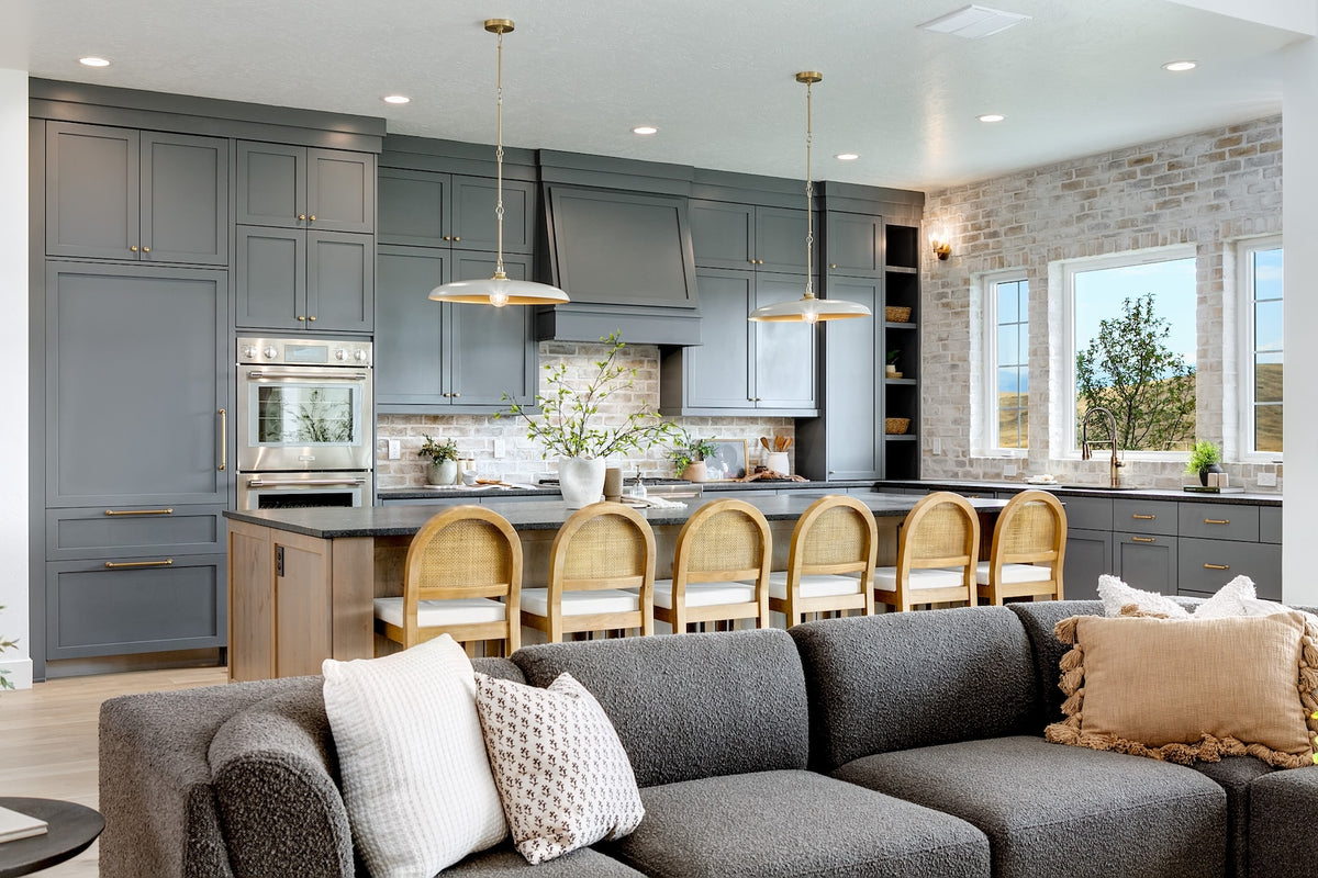 Highland Homes luxury home with gray painted cabinets and brass hardware in Valnova, Eagle,  ID
