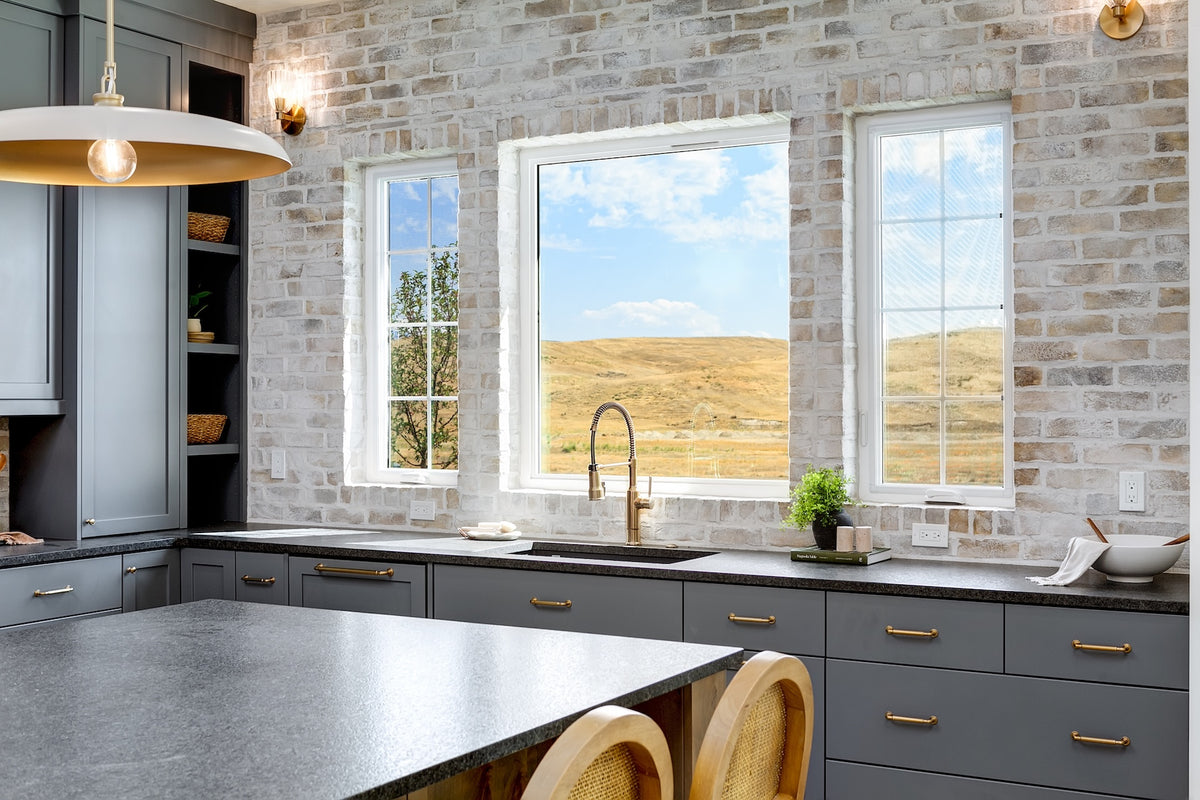 Highland Homes kitchen with painted custom cabinets in Valnova, Eagle,  ID