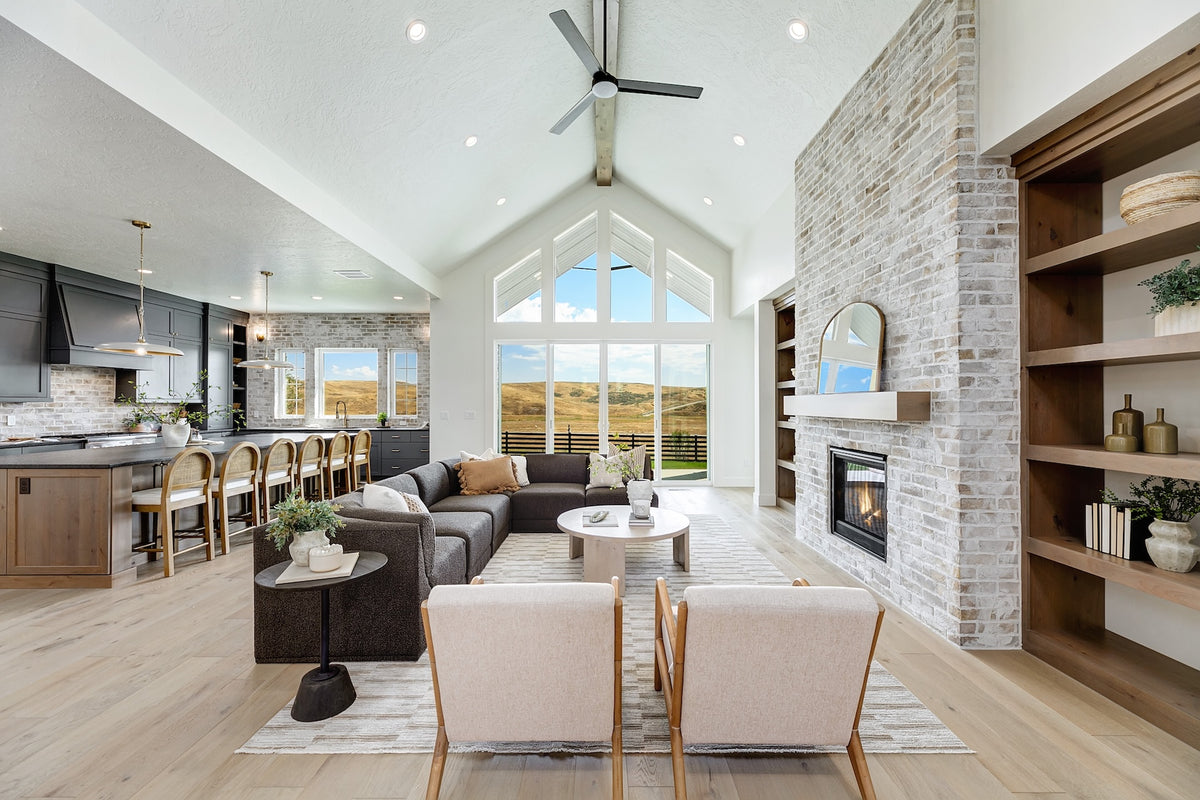 Highland Homes luxury home with brick fireplace and kitchen walls in Valnova, Eagle, ID