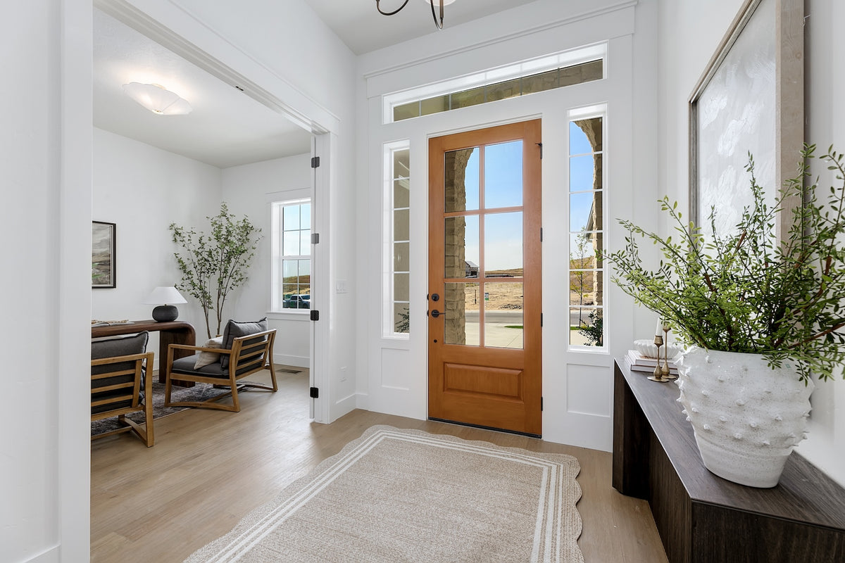 Highland Homes luxury home with beautiful foyer and home office in Valnova, Eagle, ID